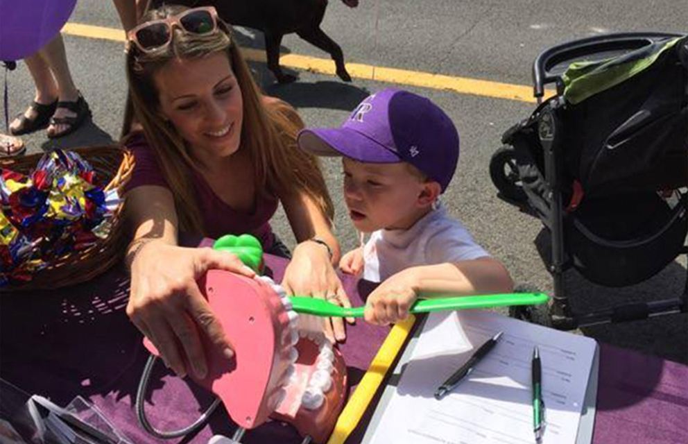 Pearl Dentistry team member working with kid