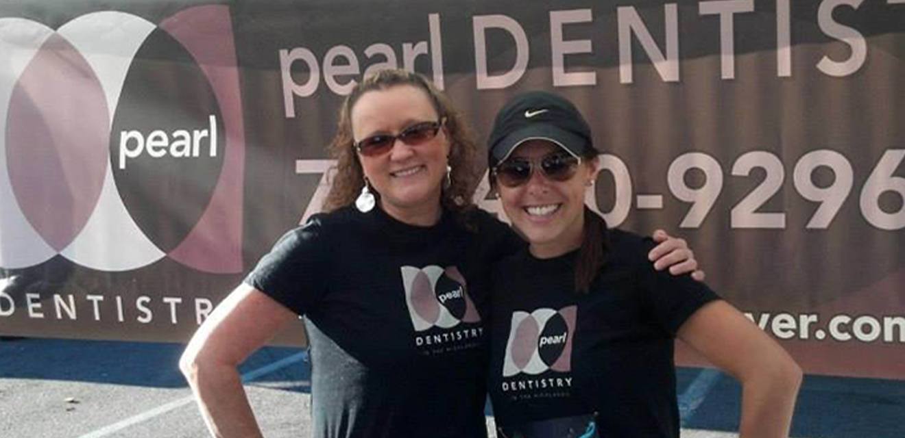 two pearl dentistry members smiling