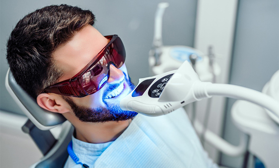 a patient receiving in-office teeth whitening