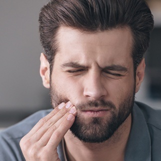 man with toothache