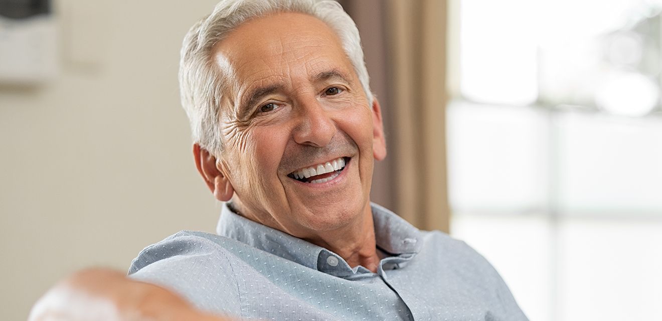 older man smiling