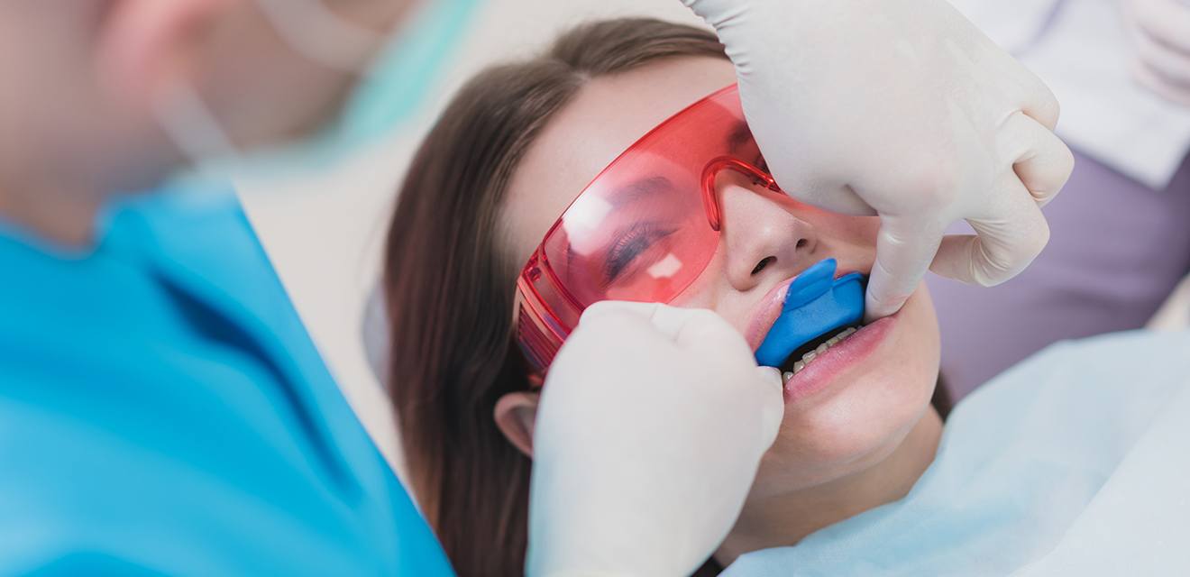 girl getting fluoride treatments