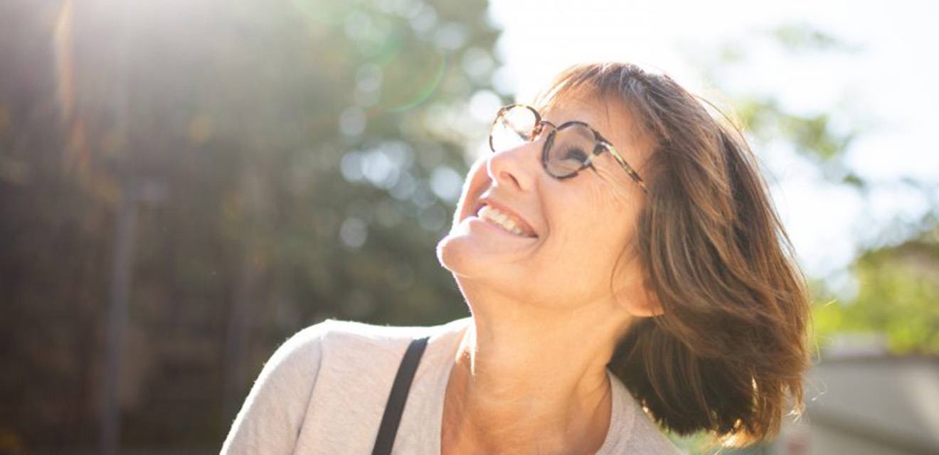 Calculator is operated near piggy bank
