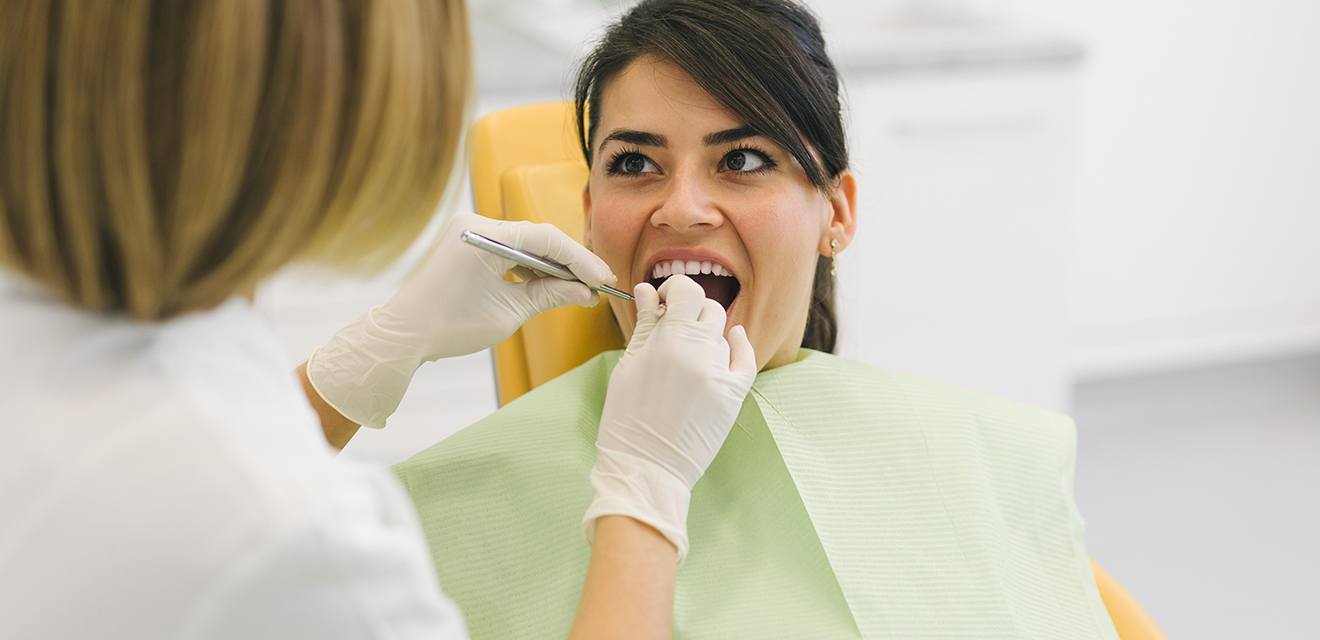 woman getting dental check up
