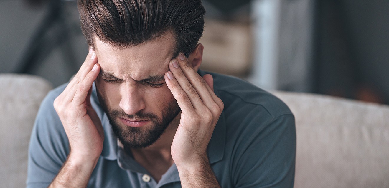 man with severe headache