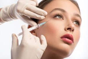 woman Botox needle