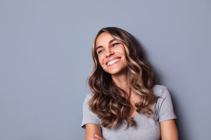 Woman smiling with white, healthy teeth