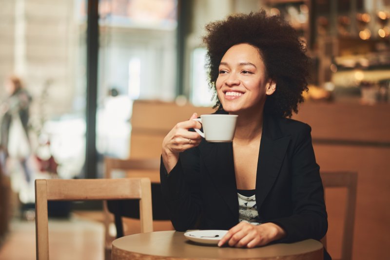 young woman drinking coffee