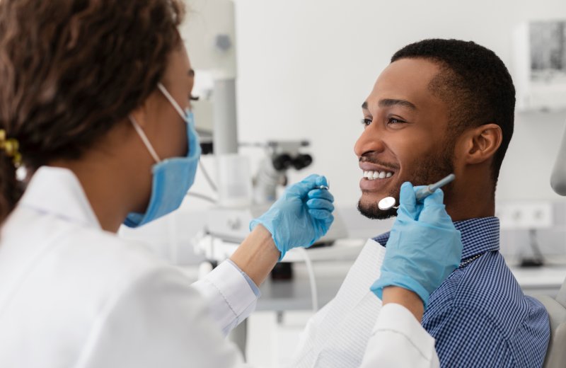 Patient smiling at their cosmetic dentistry consultation