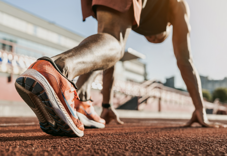 Close up of runner's shoe pivoted to sprint